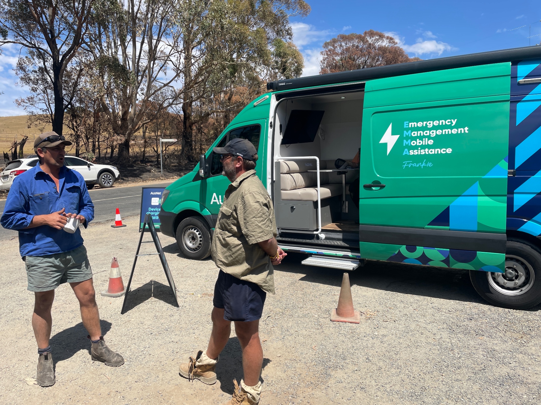 Community members beside the AusNet emergency management mobile assistance van